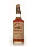A bottle of Antique 6 Year Old Kentucky Straight Bourbon Whiskey - 1960s