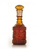 A bottle of Beam's Choice Amber Decanter - 1960s