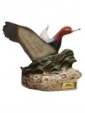 A bottle of Beam's Redhead Duck Decanter / Ducks Unlimited