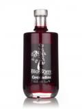 A bottle of Blossoms Grenadine Syrup