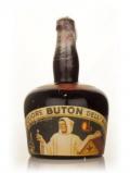 A bottle of Buton Liquore Dell’Abbade - 1949-59