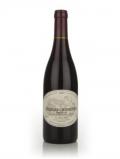 A bottle of Claude Dugat Charmes Chambertin Grand Cru 'Gibryotte' 2009