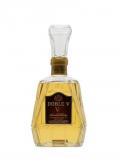 A bottle of Doble V / Hiram Walker Blended Whisky