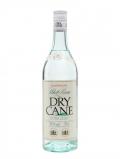 A bottle of Dry Cane Extra Light Superior White Rum / Bot.1980s