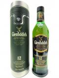 A bottle of Glenfiddich Signature Malt With Metal Green Leatherette Case 12 Year Old