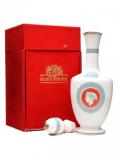 A bottle of Grand Marnier / White Decanter / Bot.1980s