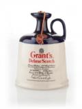 A bottle of Grant's Deluxe Scotch Decanter - 1970s