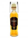 A bottle of Grant's Family Reserve with a Free Glass Blended Scotch Whisky