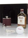 A bottle of Bells Golf Gift Set