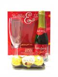 A bottle of Champagne Ferrero Rocher Champagne Glass Gift Set