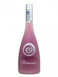 A bottle of Hpnotiq Harmonie Liqueur