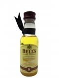 A bottle of Bells Blended Scotch Miniature 8 Year Old