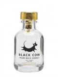 A bottle of Black Cow Vodka Minature