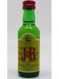 A bottle of Blended Whisky J B Rare Miniature