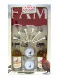 A bottle of Famous Grouse 2 X Miniatures Golf Gift Set