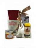 A bottle of Famous Grouse Hot Toddy Miniature Honey Mug Gift Set