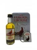 A bottle of Famous Grouse Miniature Keyring Gift Tin Set