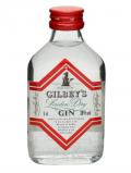 A bottle of Gilbey's Gin Miniature
