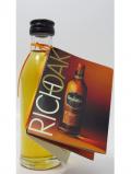 A bottle of Glenfiddich Rich Oak Promo Miniature 14 Year Old