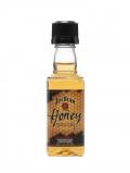 A bottle of Jim Beam Honey Miniature