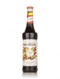 A bottle of Monin Caf (Coffee) Syrup
