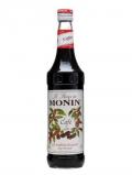 A bottle of Monin Coffee Syrup