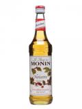 A bottle of Monin Hazelnut Syrup