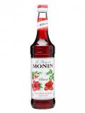 A bottle of Monin Hibiscus Syrup