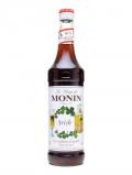 A bottle of Monin Irish Coffee Syrup