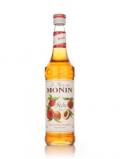 A bottle of Monin Pche (Peach) Syrup