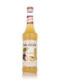 A bottle of Monin Pia-Colada Syrup
