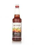 A bottle of Monin Th Pche (Peach Tea) Concentrate 1l