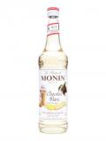 A bottle of Monin White Chocolate Syrup