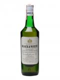 A bottle of Black& White / Bot.1980s Blended Scotch Whisky