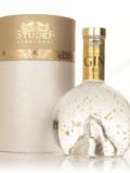 A bottle of Studer Swiss Gold Gin