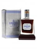A bottle of Unhiq XO Unique Malt Rum