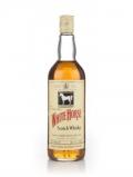 A bottle of White Horse Blended Scotch Whisky 70° Proof - 1970s