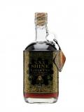 A bottle of XXX Shine LiberTea American Whiskey Liqueur